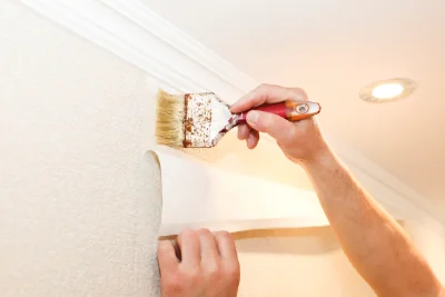 Pose de papier peint à Colleville — revêtements muraux et toiles de verre